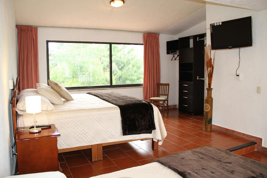 Hotel Quinta Del Sol Tepoztlán Zimmer foto